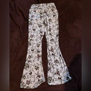 Purple with dark purple flowers. Yoga pants wide legs size 14